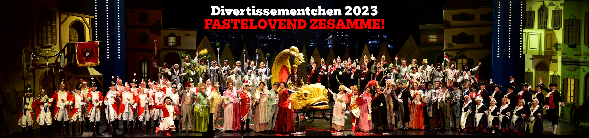 Fastelovend zesamme! - Divertissementchen 2023 - Gruppenfoto aller Sänger und Tänzer im Bühnenbild